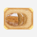 Freshly sliced artisan bread loaf displayed on a durable non-slip color-coded cutting board, showcasing a medium-sized kitchen prep board for safe food preparation and everyday cooking.