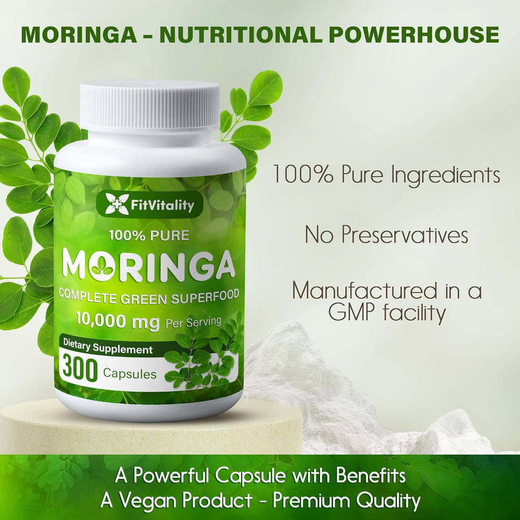 Bottle of FitVitality Moringa supplement with green leaves on a light background. Moringa Capsules | 300 Capsules | Moringa Oleifera | 10,000mg
