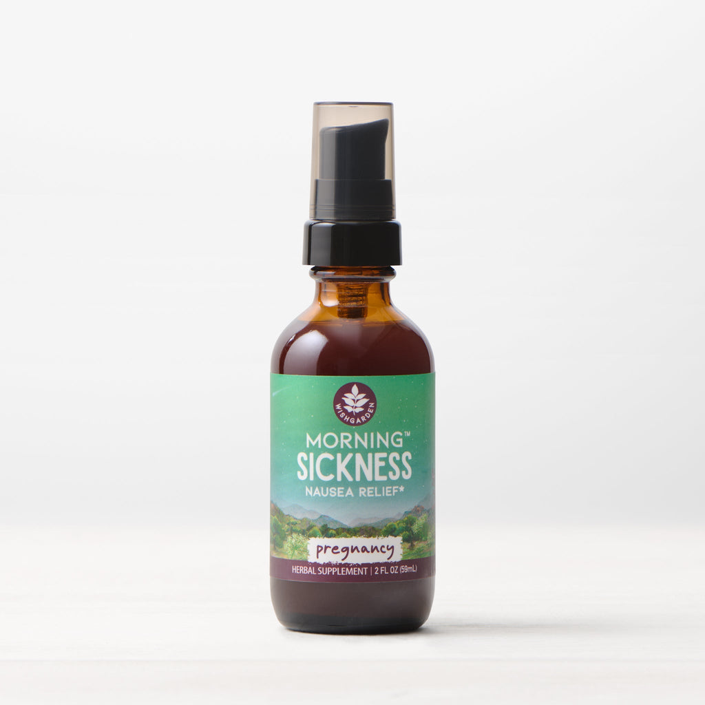 Bottle of 'Morning Sickness Nausea Relief' with a green label on a white background. Herbal liquid pump bottle with Marshmallow root, Dandelion root, Burdock root, Cardamom seed, Cinnamon bark, Ginger root.