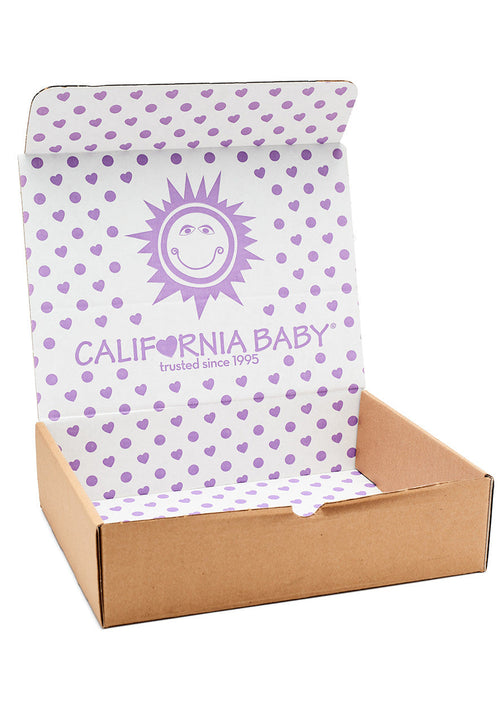California Baby product packaging with purple heart pattern and cardboard display box. California Baby® $40 Mystery Gift Box | Premium Baby & Toddler Gift Set | Tree of Life Grocers