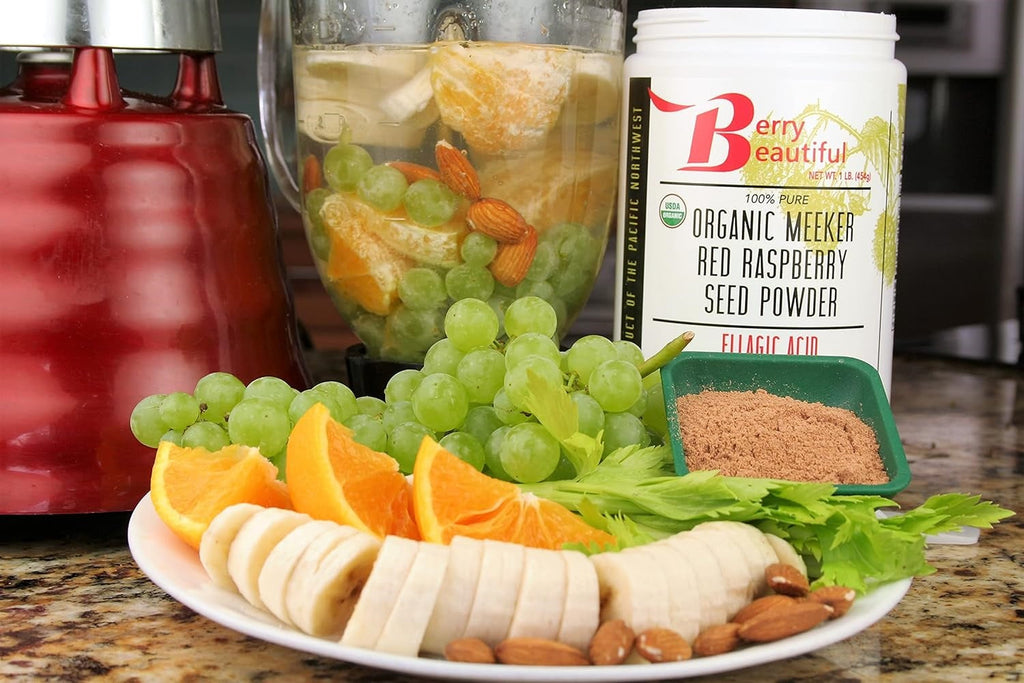 Platter of fruits and vegetables with a container of Berry Beautiful powder on a kitchen counter.