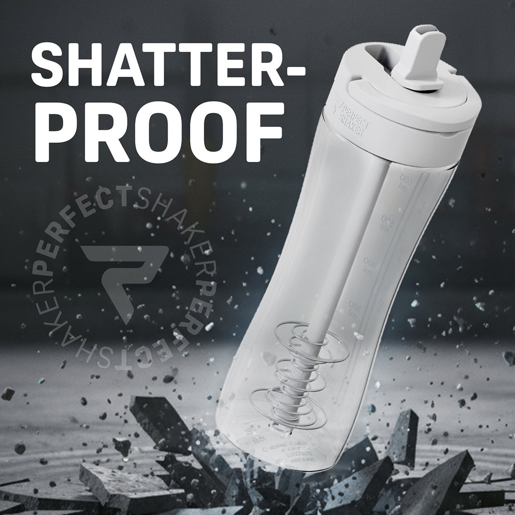 A clear plastic shaker bottle with a white lid and straw, shown at an angle with a large 'SHATTER-PROOF' text overlay and a circular 'SHAKERPERFECT' watermark. The background is dark gray with a dramatic shattered glass effect at the bottom.