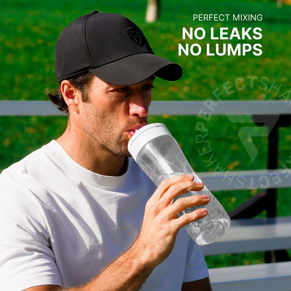 A man wearing a black cap and white t-shirt drinking from a clear plastic water bottle with a white lid, set against a green grassy background with text overlays.