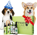 Paw Fume premium gift set with two dogs wearing party hats on a white background