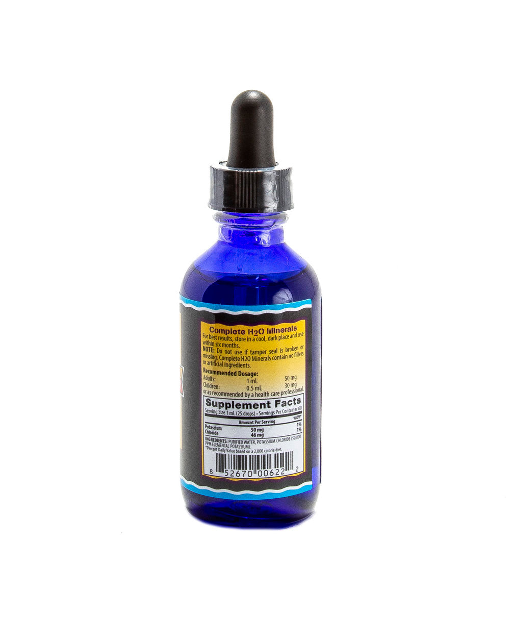 Blue glass bottle with a dropper on a white background