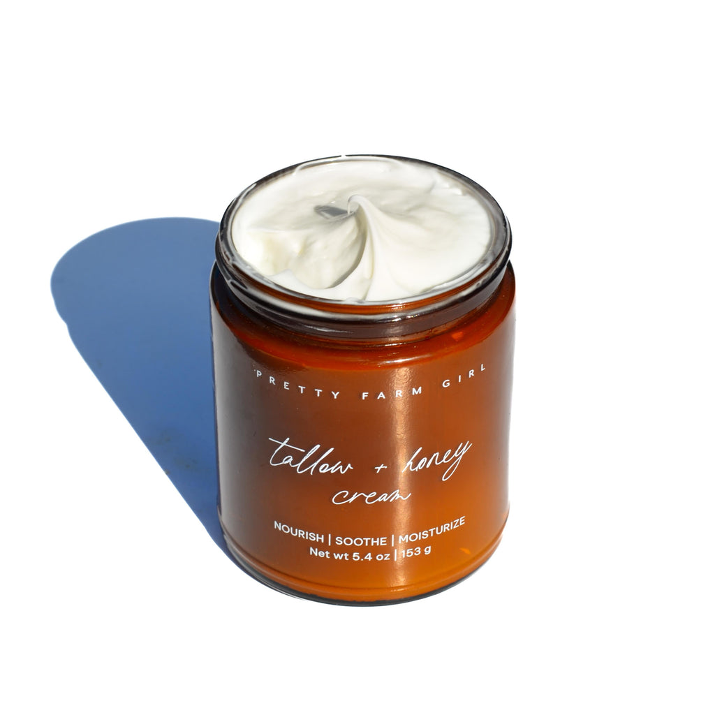 Jar of 'Pretty Farm Girl' tallow + honey cream on a white background. Fragrance Free Tallow + Honey Cream for Sensitive Skin