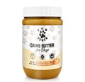 Dawg Butter Pum'kin Puppers Pumpkin Peanut Butter for Dogs in 17 oz jar with pumpkin, peanuts, cinnamon, and white label on a white background.