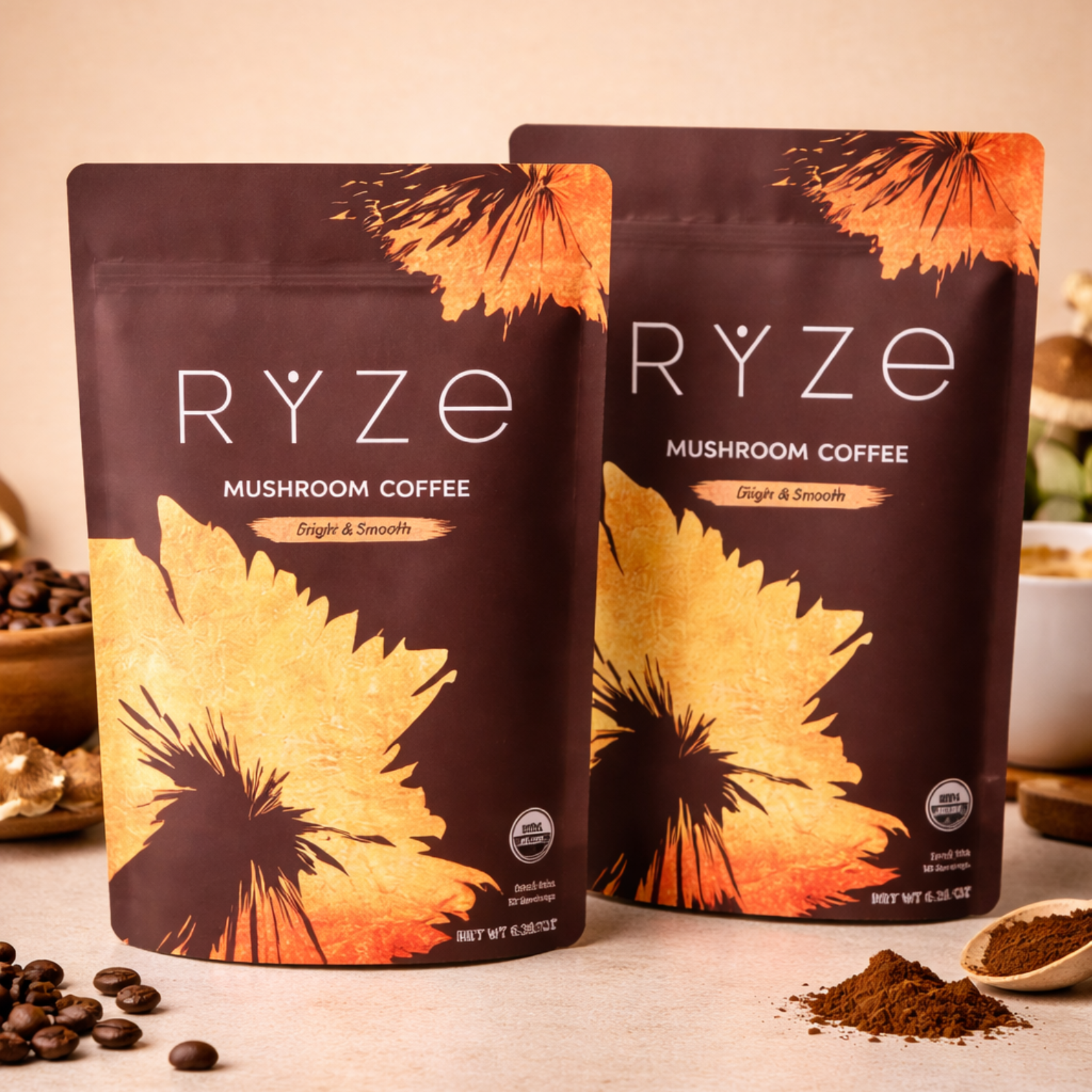 Two RYZE Superfoods Mushroom Coffee resealable stand-up pouches featuring organic Arabica coffee, six adaptogenic mushrooms, and MCT oil for clean energy, focus, and wellness.