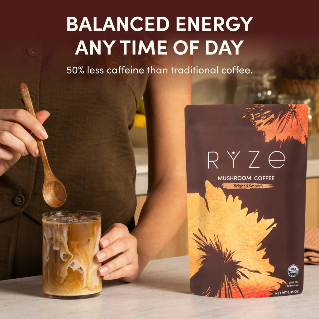 RYZE Superfoods Mushroom Coffee pouch beside a freshly made iced coffee with text highlighting balanced energy and 50% less caffeine than traditional coffee.