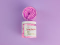 Raspberry Vanilla Boobies Tightening & Lifting Sugar Scrub with whipped raspberry-pink exfoliating polish in a reusable jar, luxury body exfoliant made with natural ingredients to gently smooth, soften and renew skin. Clean beauty, vegan, cruelty-free, paraben-free, gluten-free formula in recyclable packaging from a female-owned brand for radiant, silky-soft skin.