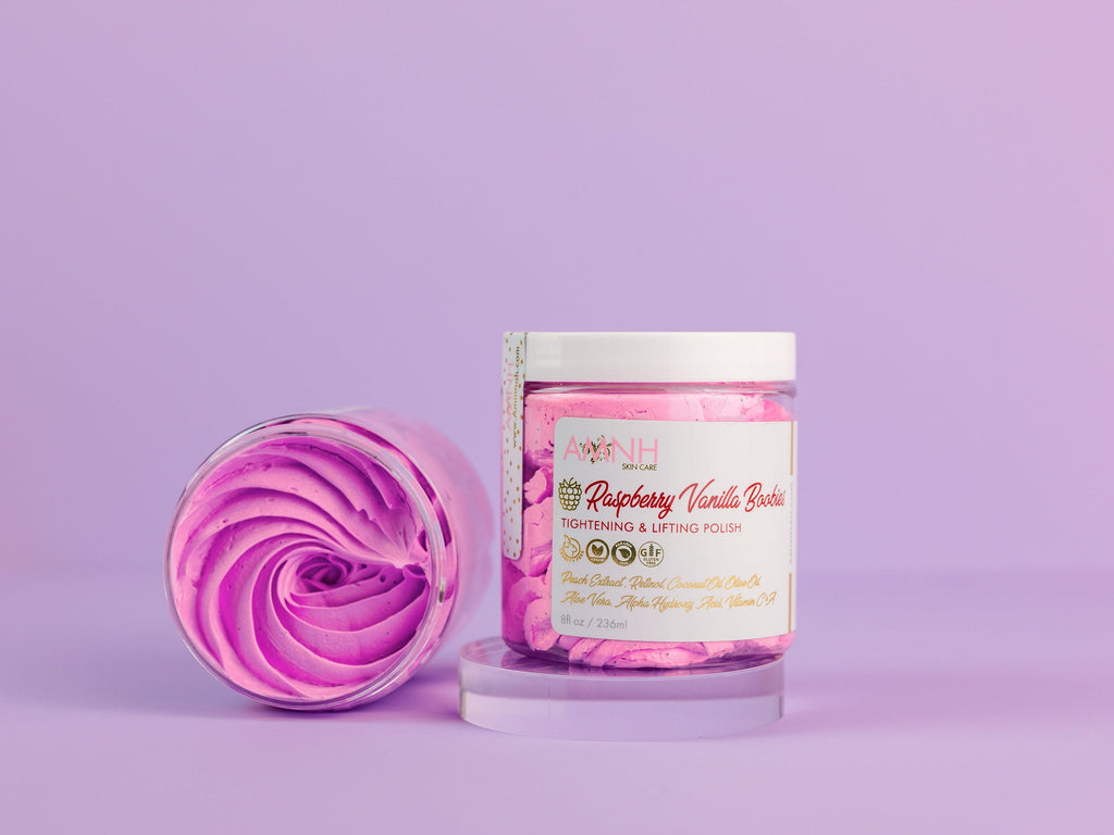 Raspberry Vanilla Boobies Tightening & Lifting Sugar Scrub with whipped raspberry-vanilla exfoliating polish in a reusable jar, luxury body scrub made with natural ingredients to gently exfoliate, smooth, soften, and nourish skin. Clean beauty, vegan, cruelty free, paraben free, gluten free formula with recyclable packaging from a female owned brand for radiant, silky-soft skin.