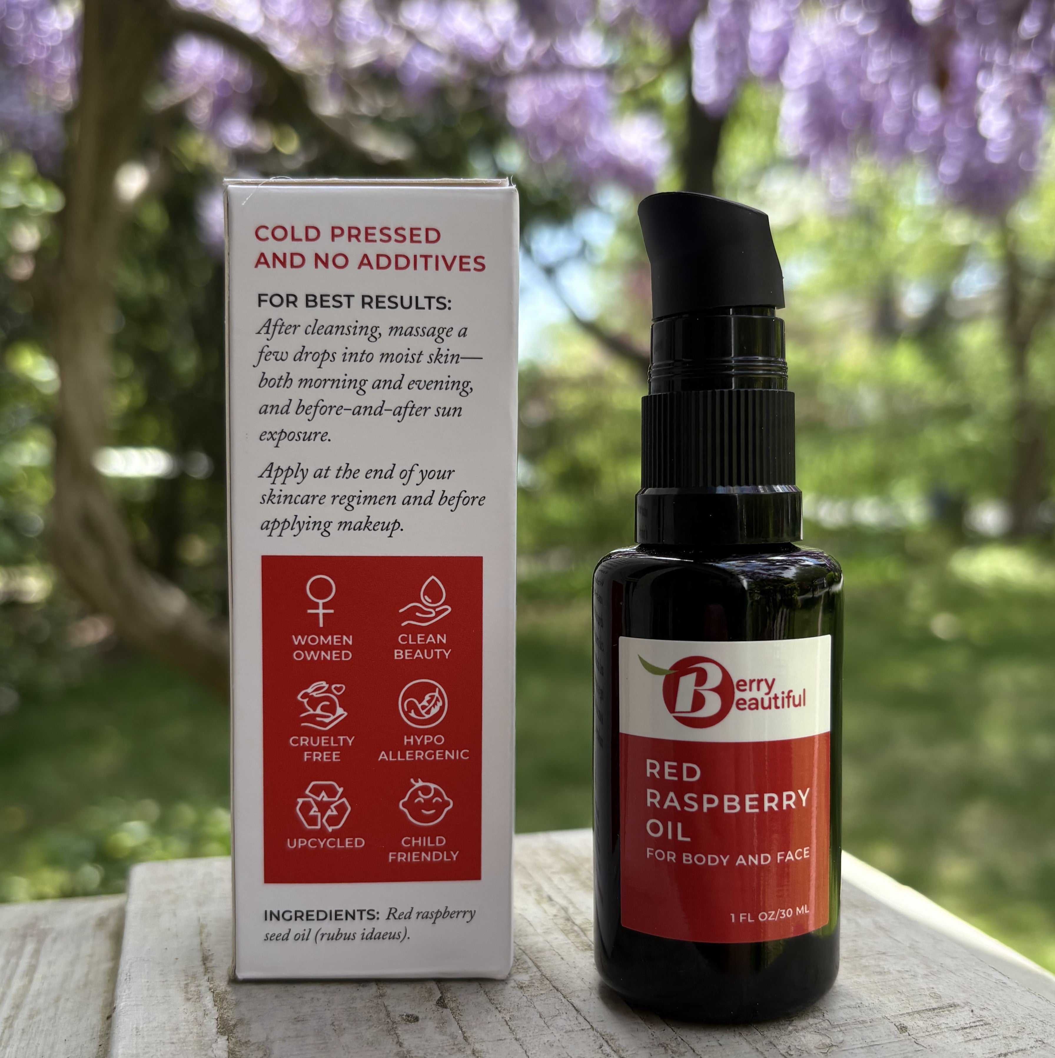 Red Raspberry Oil bottle and packaging with a natural background