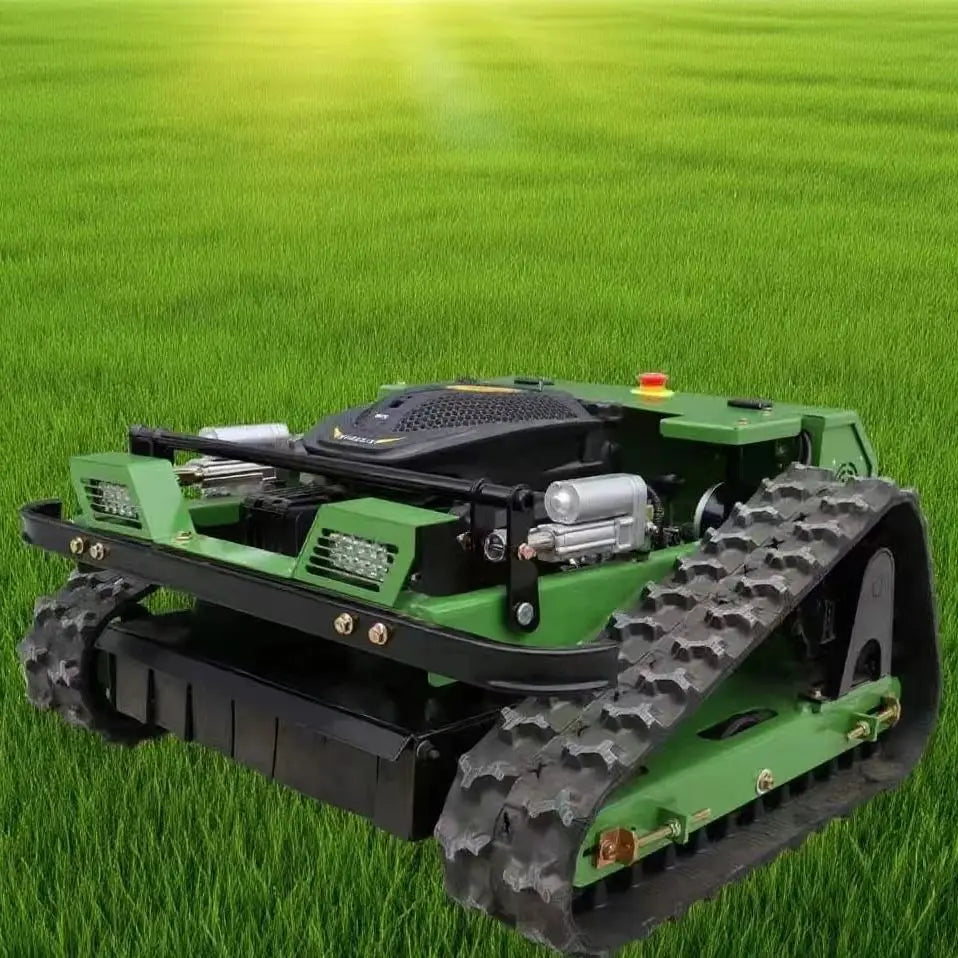 A green and black robotic lawn mower with caterpillar tracks, shown on a bright green grass background.