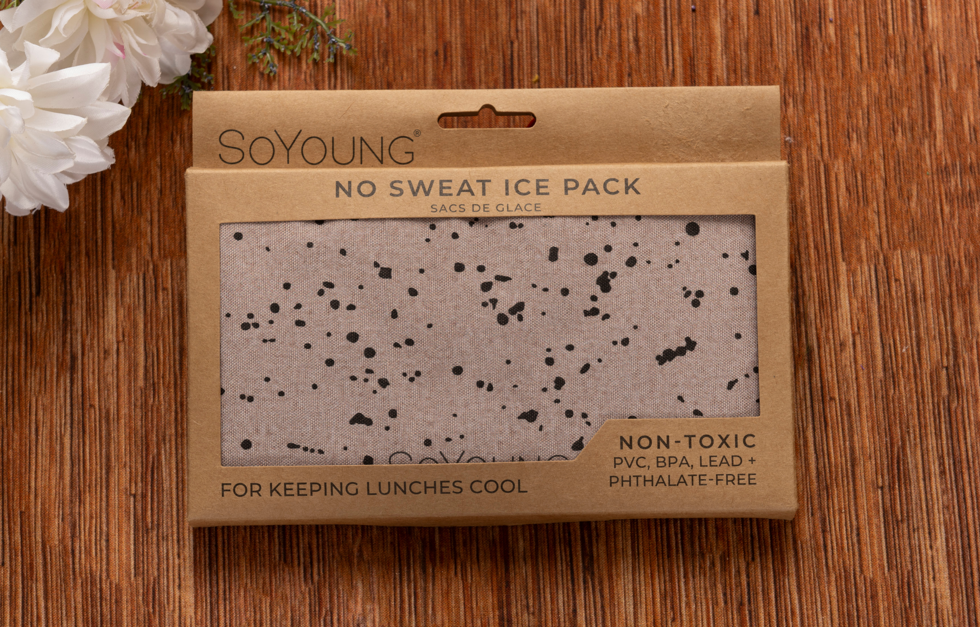 SOYOUNG No Sweat Ice Pack reusable non-toxic lunch cooler ice pack, BPA-free PVC lead and phthalate-free cold pack in natural wood packaging with white flowers, Tree of Life Grocers