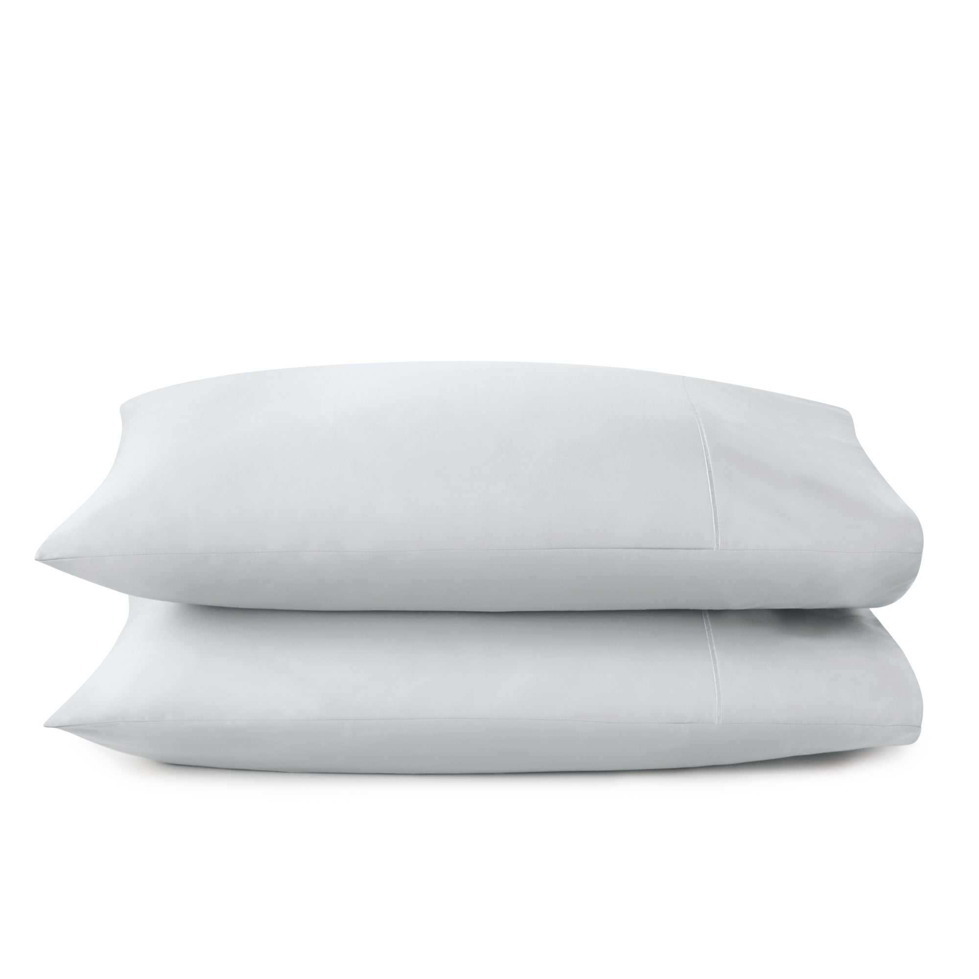 Two beige pillows stacked on a white background. 100% GOTS-Certified &amp; Fairtrade-Certified Organic Cotton
Ethically made in India
Truly soft 300-thread-count sateen weave
Envelope enclosure
Non-toxic, hypoallergenic, naturally breathable and cooling
Easy Care, Machine Wash and Tumble Dry
