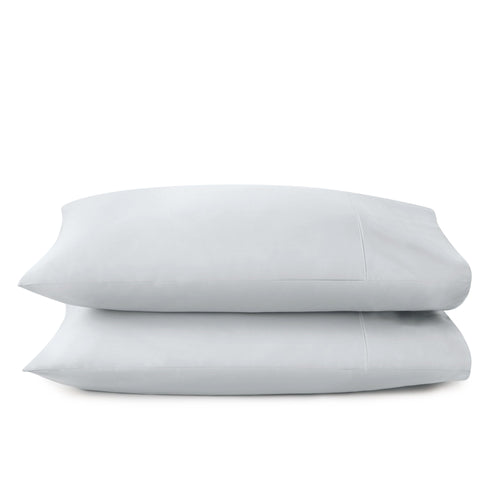 Two beige pillows stacked on a white background. 100% GOTS-Certified &amp; Fairtrade-Certified Organic Cotton
Ethically made in India
Truly soft 300-thread-count sateen weave
Envelope enclosure
Non-toxic, hypoallergenic, naturally breathable and cooling
Easy Care, Machine Wash and Tumble Dry