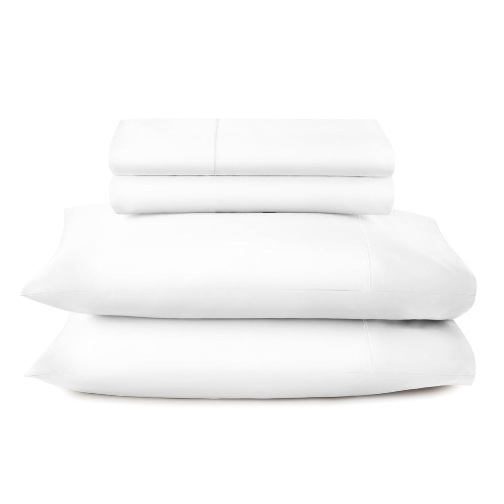 Stack of white folded towels on a white background. 100% GOTS-Certified &amp; Fairtrade-Certified Organic Cotton
Made in India
High quality, dense 500-thread-count sateen weave becomes luxuriously soft with washing
Durable elastic band
Non-toxic, hypoallergenic, naturally breathable, and cooling
16" deep pocket, ideal for plush mattresses
Easy Care, Machine Wash and Tumble Dry