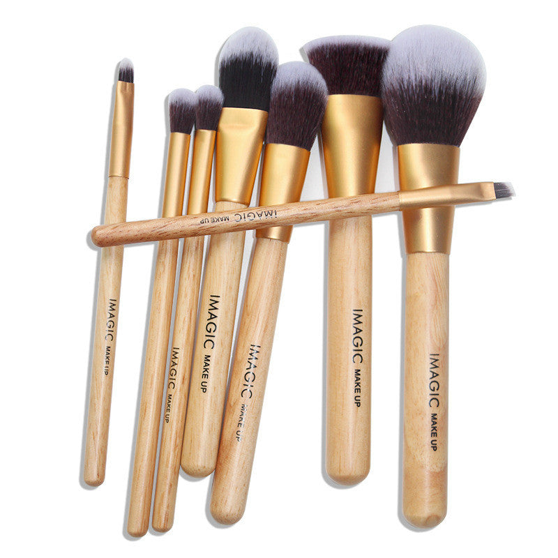 Set of makeup brushes with wooden handles and black bristles, branded 'IMAGIC MAKE UP'.