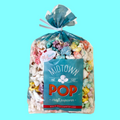 Bag of Midtown Pop craft popcorn with a blue label on a light blue background