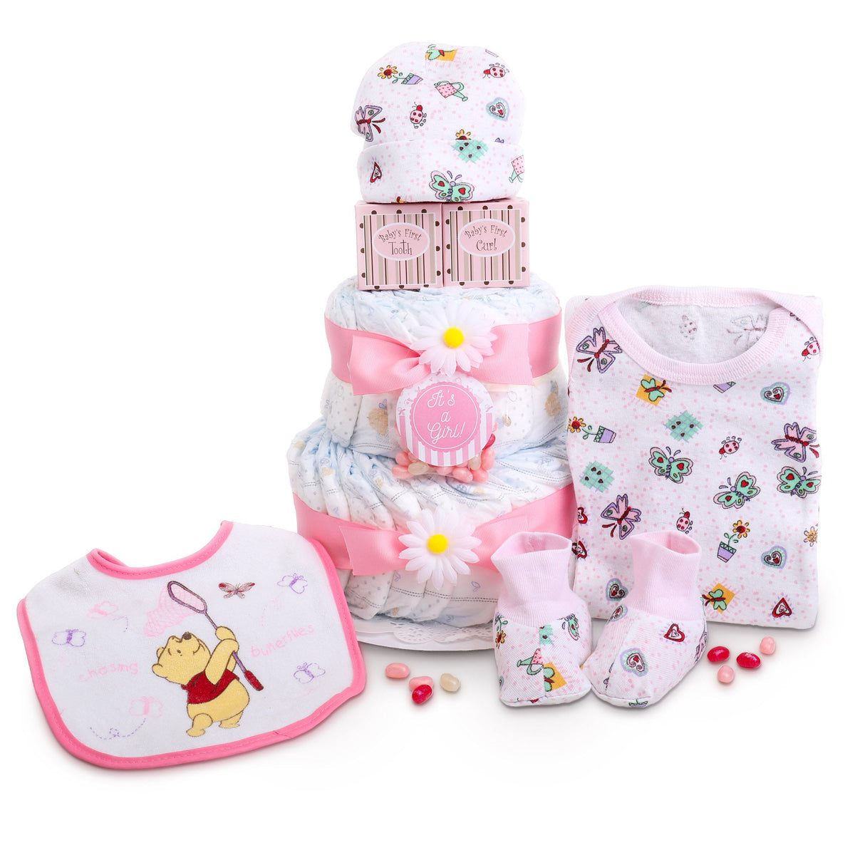 Baby gift set with diaper cake shape, bib, booties, and hat on a white background. Sweet Baby Girl Diaper Cake Gift: 28 Huggies Diapers, Baby's First Tooth Box, Baby's First Curl Box, Layette Set, Hand & Foot Plaster Mold Kit.