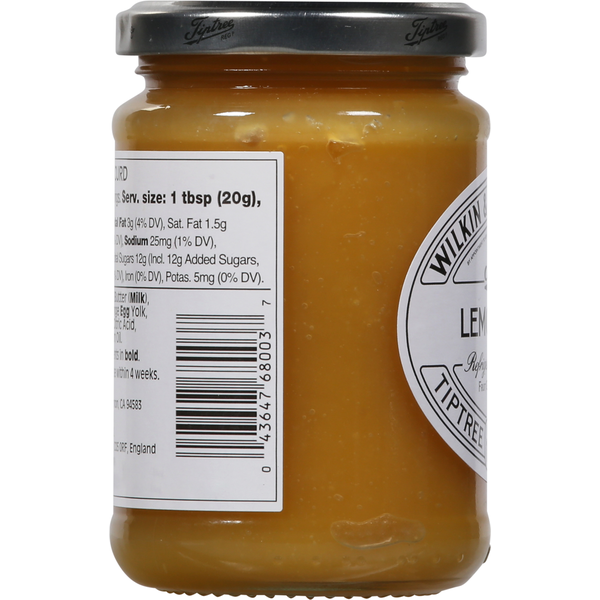 Jar of Tiptree Lemon Curd side label showing product branding and ingredients on a white background. Traditional English lemon curd spread by Wilkin & Sons Limited, 11 oz jar.