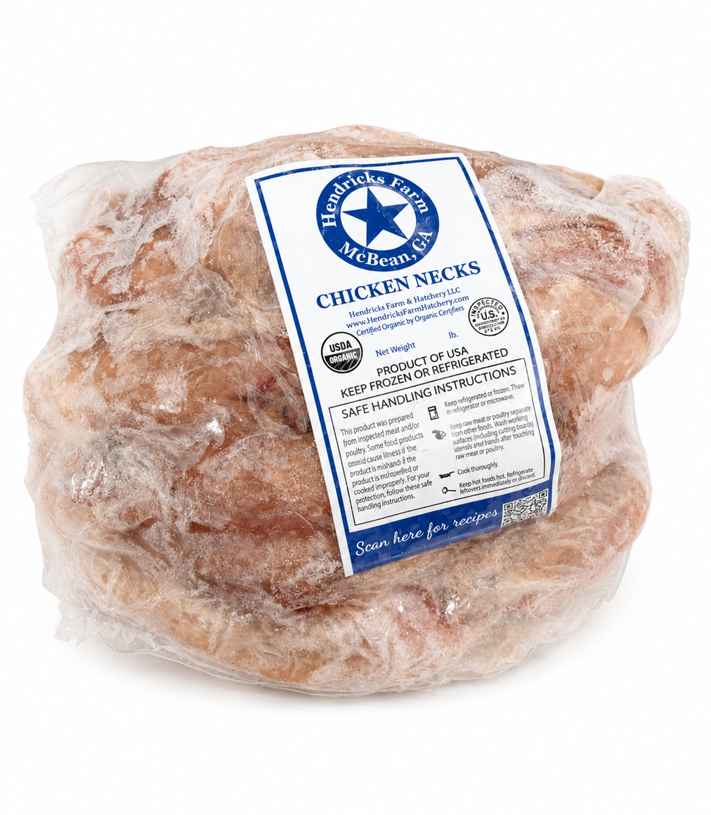 A vacuum-sealed package of USDA Certified Organic pasture-raised chicken necks from Hendricks Farm Hatchery, showing raw chicken necks in clear packaging with a blue-and-white organic label. Non-GMO, soy-free, and raised on non-medicated feed. Ideal for homemade stocks, broths, soups, and raw pet diets.