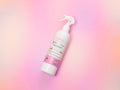 Unicorn Dreams Room Spray by AMINNAH on a soft pink background – natural ingredients, clean beauty, vegan, cruelty-free, paraben-free, gluten-free home fragrance in recyclable packaging from a female-owned brand.