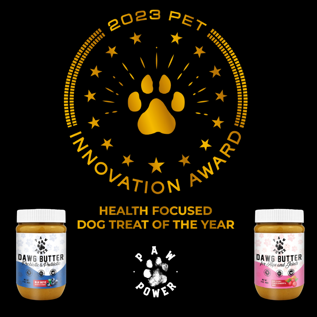 2023 Pet Innovation Award for health-focused dog treat of the year with 'Dawg Butter' jars on a black background.