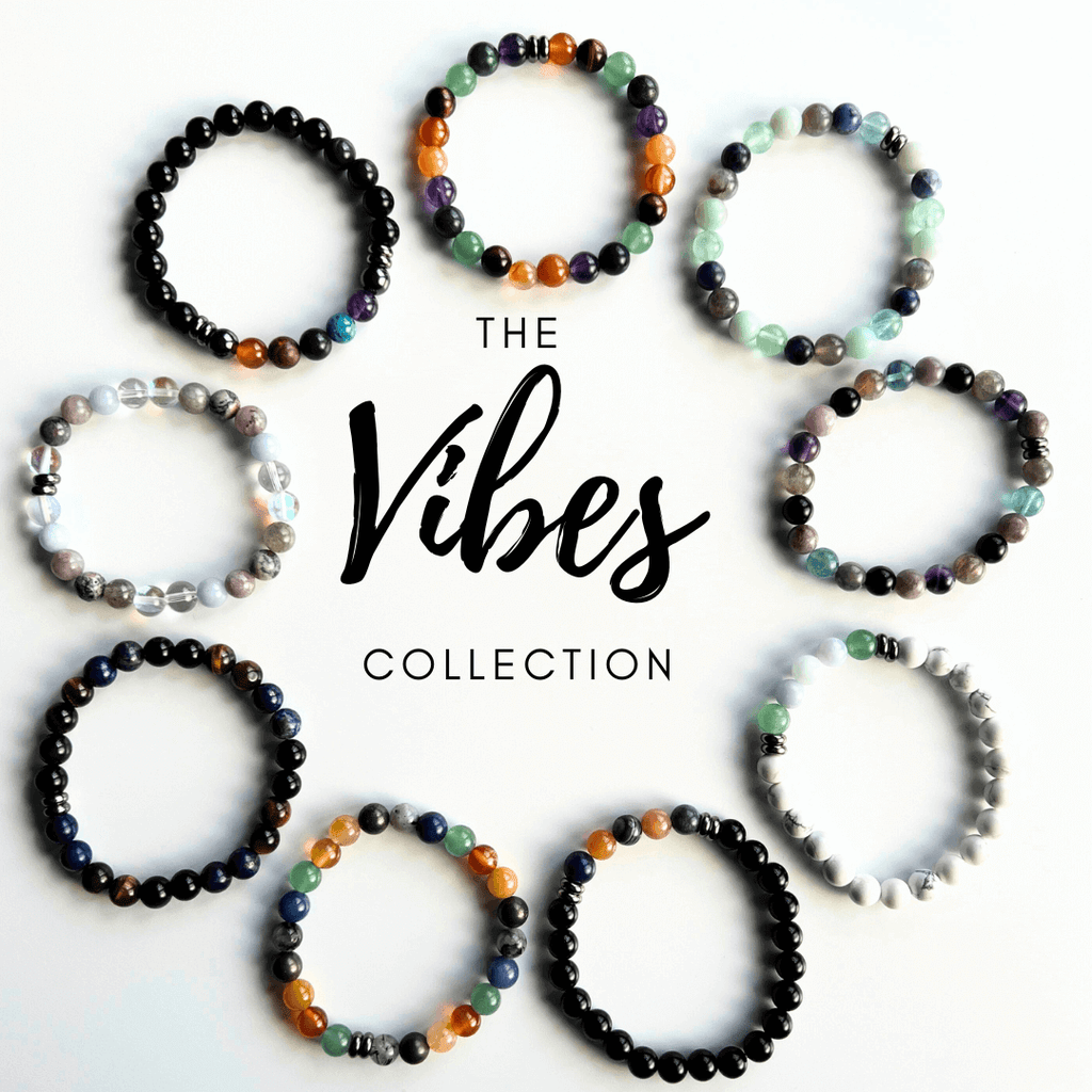 Collection of beaded bracelets from 'The Vibes' collection on a white background. Abundance & Motivation Vibes Bracelet