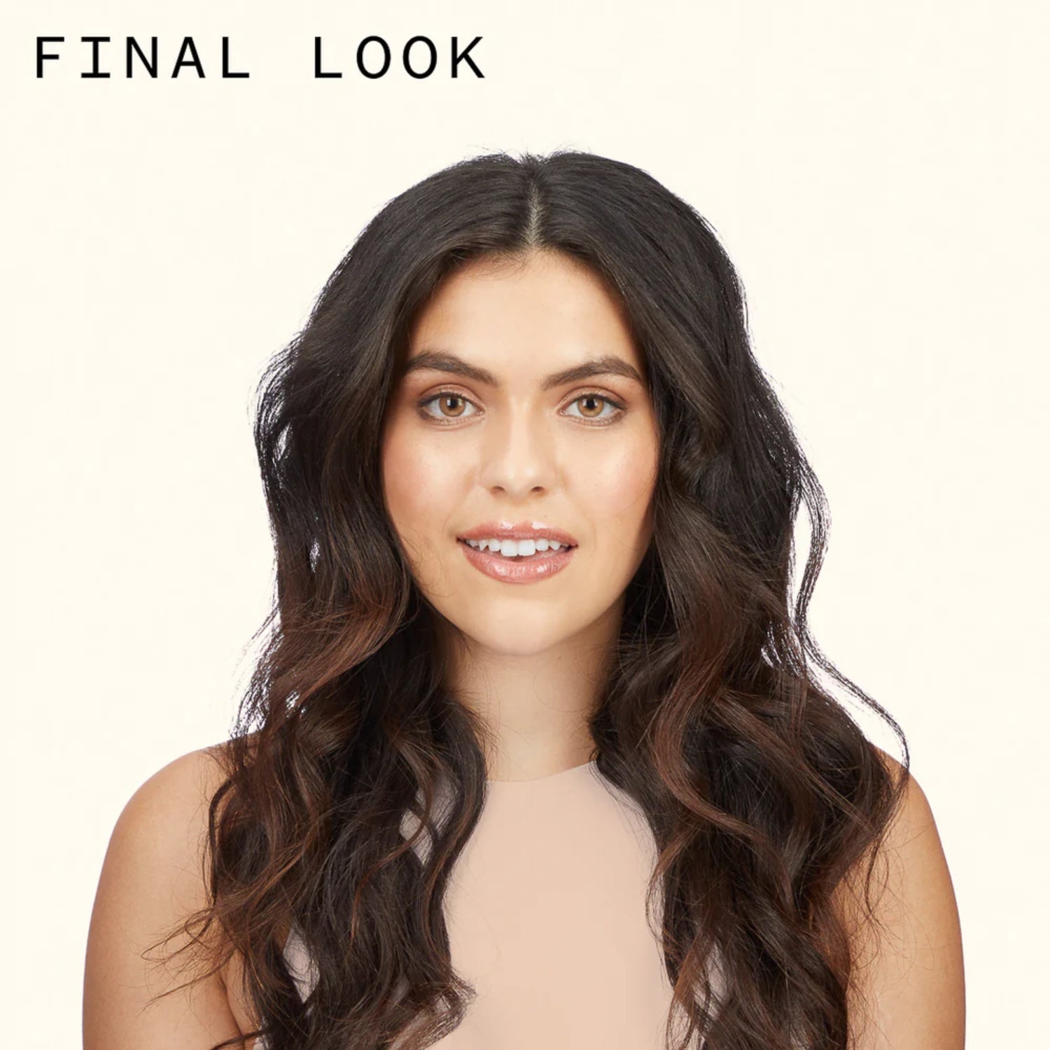 Amika Plus Size Perfect Body Mousse final look showing long, voluminous wavy hair with soft, touchable body and full, defined waves.