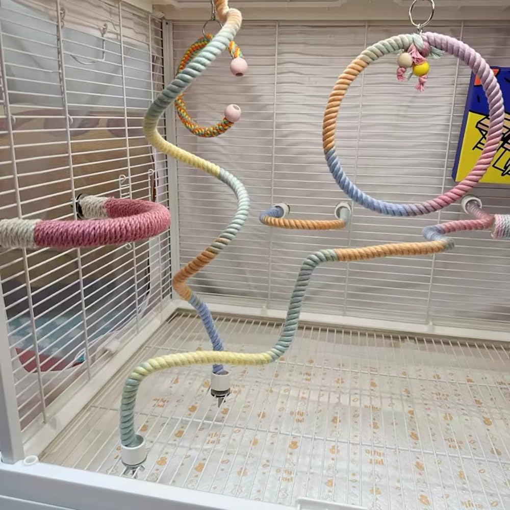 Colorful bendable bird rope perch play gym installed inside a bird cage, featuring soft gradient rainbow climbing perches, circular swings, spiral climbing ropes, and hanging toys designed for parrots, cockatiels, parakeets, conures, lovebirds, budgies, and other small pet birds.