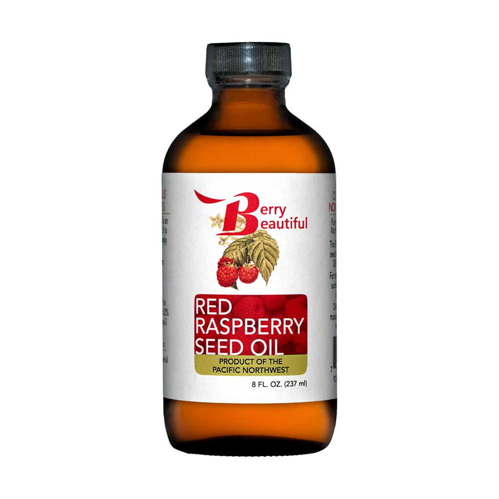 Bottle of Red Raspberry Seed Oil with a visible label on a white background