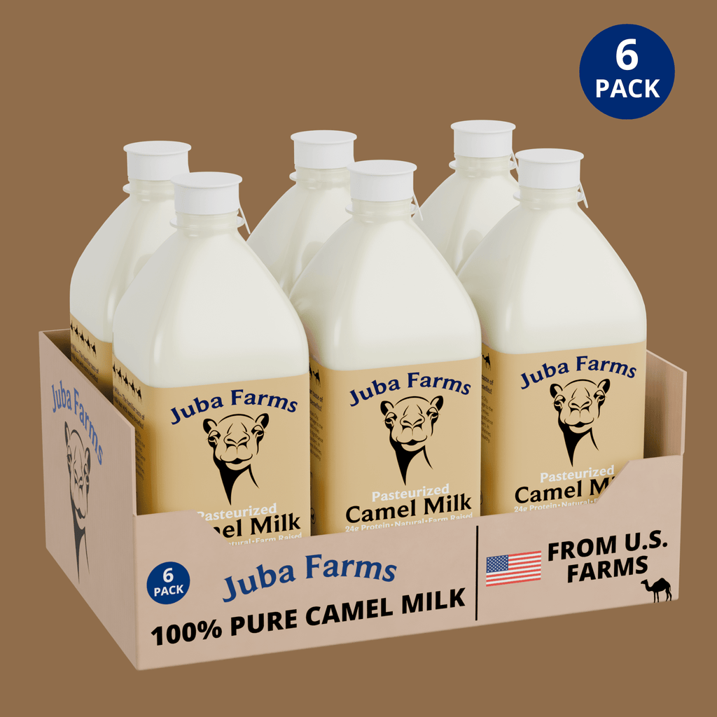 Six 1-liter bottles of Juba Farms 100% pure lightly pasteurized camel milk in a 6-pack display case, sourced from U.S. farms, refrigerated whole camel milk, high-protein dairy beverage.