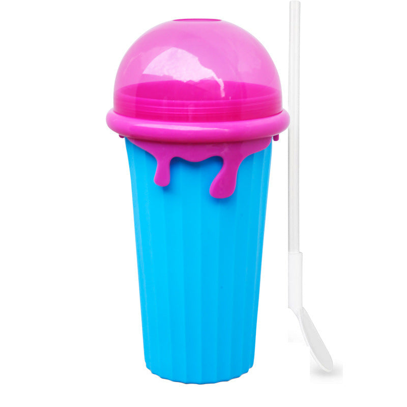 Blue reusable 500ml slushy maker cup with a pink ice cream-shaped lid and matching spoon, BPA-free silicone DIY smoothie freezer cup for homemade frozen drinks and slushies.