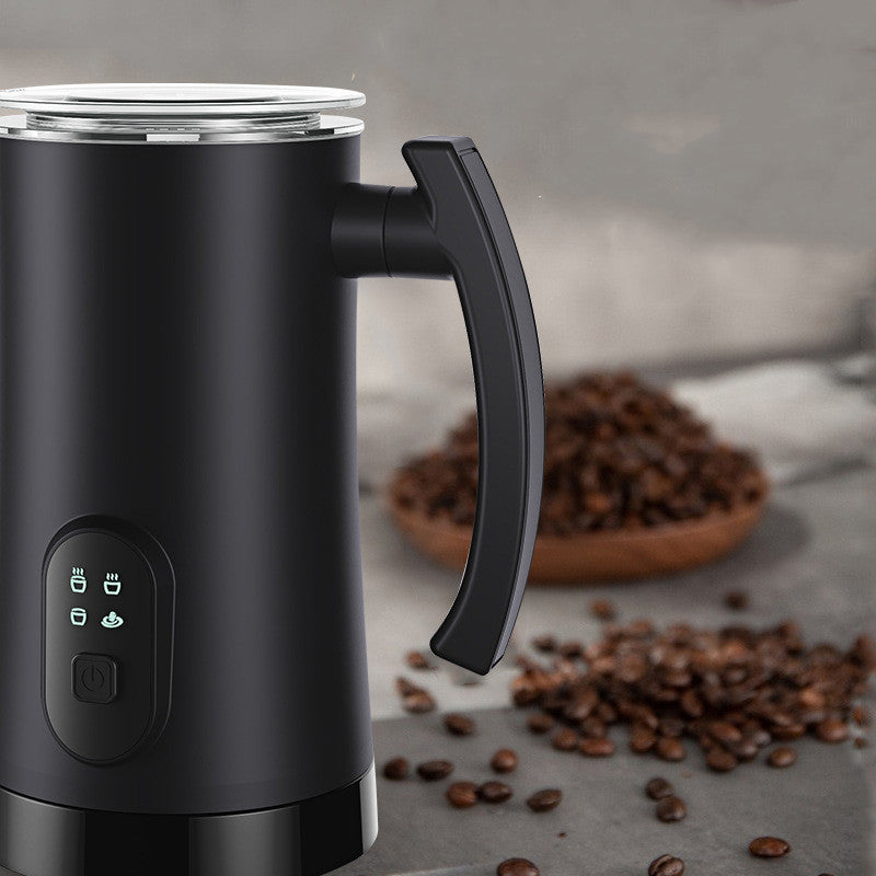 Black automatic hot and cold electric milk frother with ergonomic handle, digital controls and coffee beans, ideal for lattes, cappuccinos and café drinks.