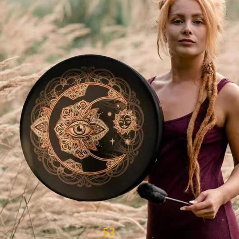Handmade shaman drum with ornate gold Tree of Life, celestial moon, sun and eye design, spiritual percussion instrument for meditation, sound healing and rituals