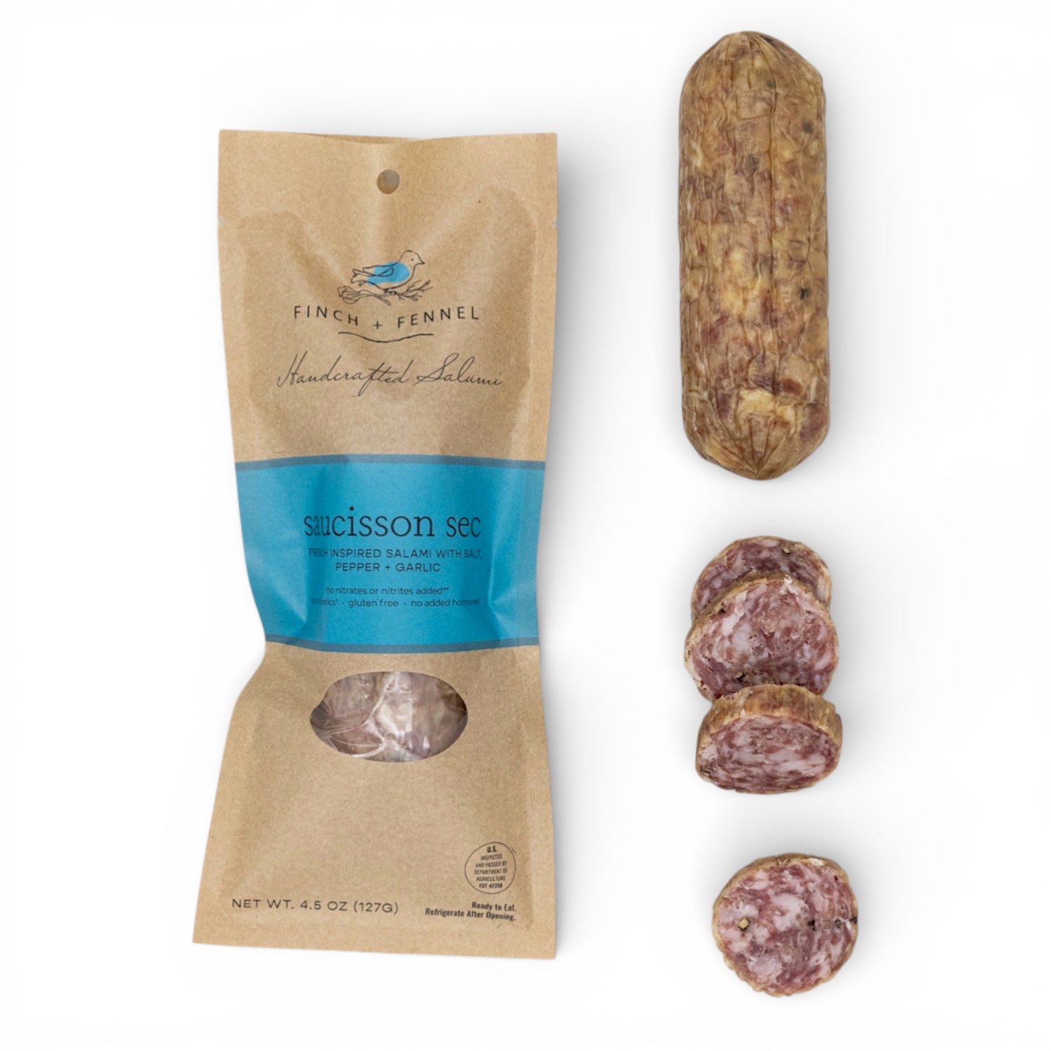 Packaged salami with sliced pieces on a white background French Saucisson Sec Salumi | Finch + Fennel
