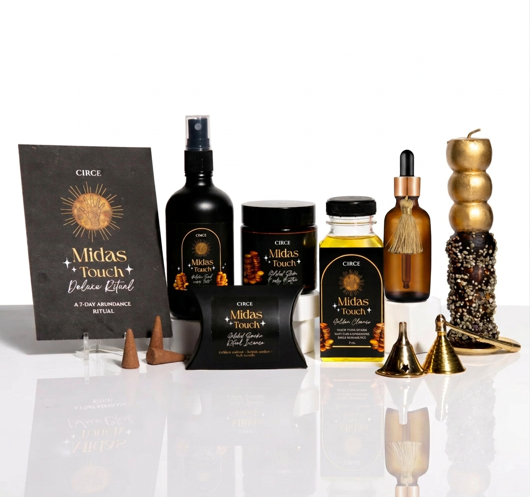 Circe Midas Touch Deluxe Ritual Collection abundance manifestation self-care gift set with golden body oil, ritual spray, skincare, incense, gold candle and luxury spiritual wellness products in elegant black and gold packaging.