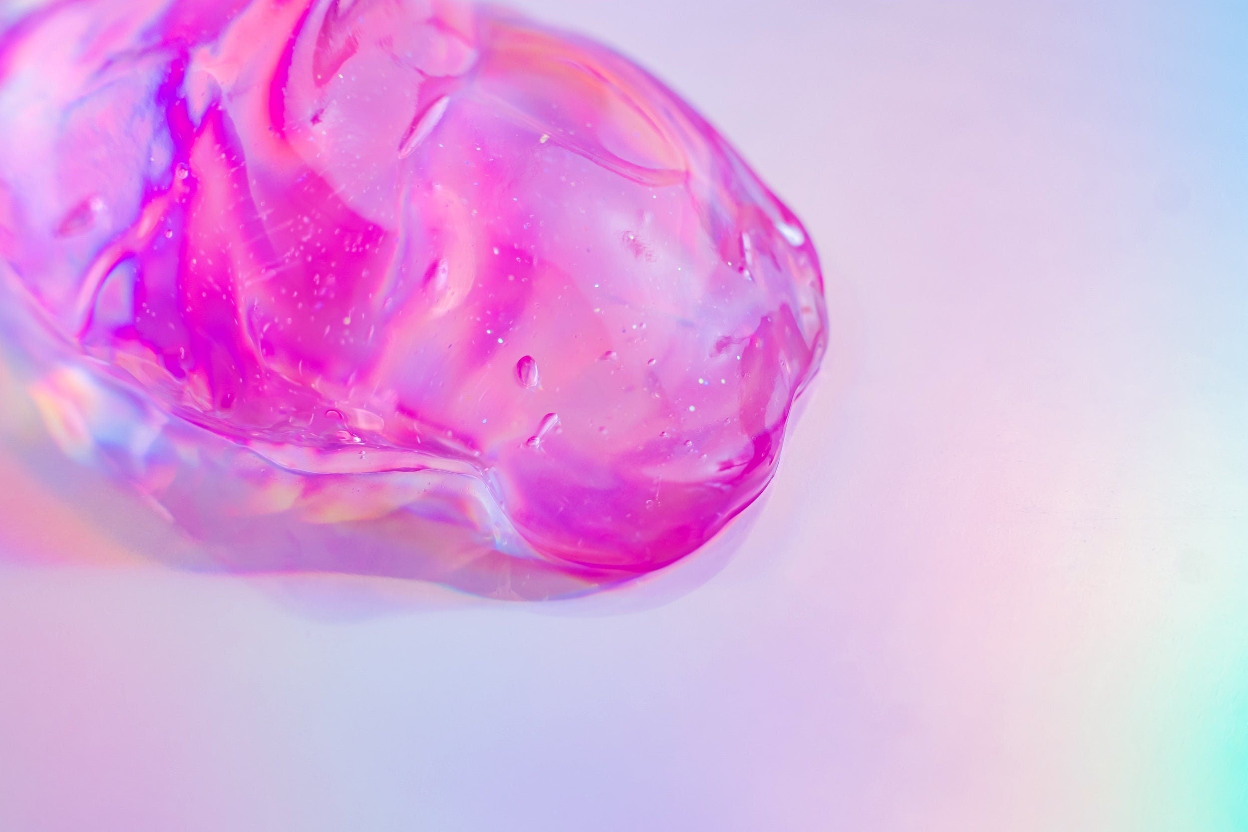 Rose Jelly Face Mask with luxurious rose-infused jelly texture on a soft iridescent background. Clean beauty skincare made with natural ingredients, cruelty-free, vegan, and from a female-owned brand. Hydrating facial mask designed to soothe, nourish, and promote a healthy, radiant-looking complexion.