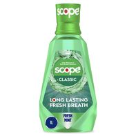 Scope mouthwash bottle with green label on a white background