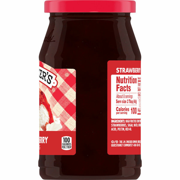 Jar of Smuckers strawberry jelly with red lid and label on a white background