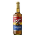 Torani Caramel syrup bottle on a white background