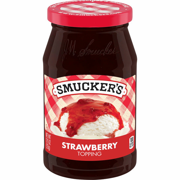 Jar of Smucker's strawberry jelly with a red lid on a white background