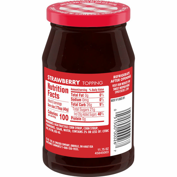 Jar of Smuckers strawberry topping with a red label on a white background
