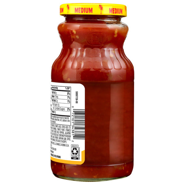 Jar of tomato sauce with a yellow lid on a white background