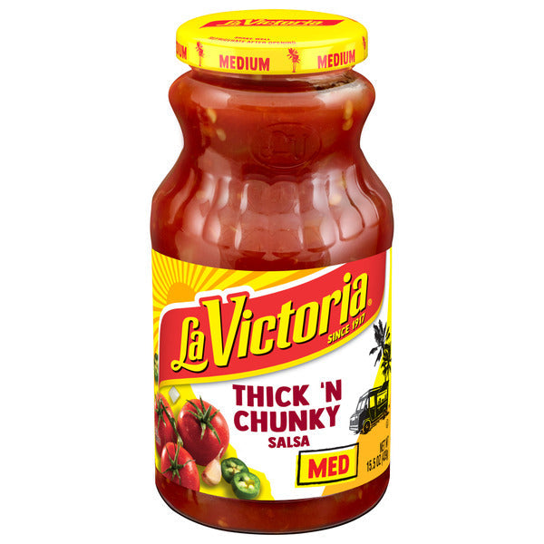 Jar of La Victoria Thick 'N Chunky Salsa with yellow lid on a white background