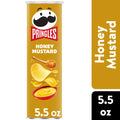 Pringles Honey Mustard potato chip can on a white background