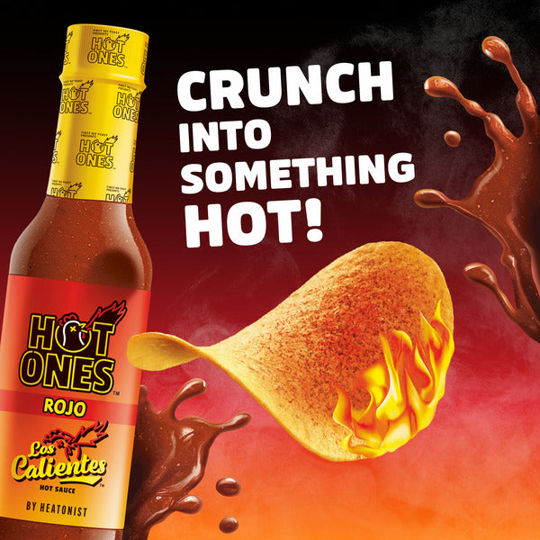 Hot Ones Rojo sauce bottle with a flaming chicken wing on a fiery background