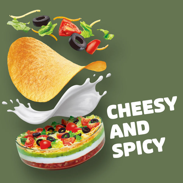 Tortilla chip with a bowl of salad and text 'Cheesy and Spicy' on a green background