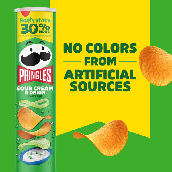 Pringles Sour Cream & Onion flavor packaging with text about artificial colors on a green and yellow background.